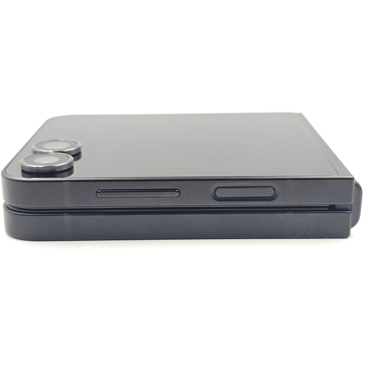 A Samsung Galaxy Z Flip 7FE device closed  with a glossy finish, shown from a side profile view against a plain white background.