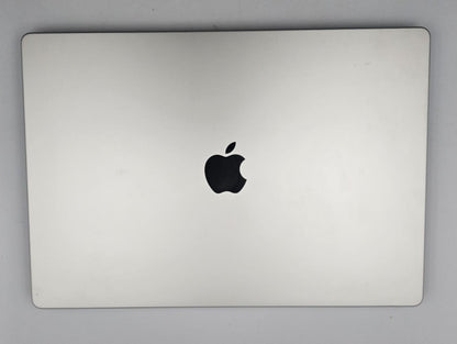 A closed silver Apple Mac Book Pro  laptop, likely a MacBook, shown from the top lid against a neutral gray background.